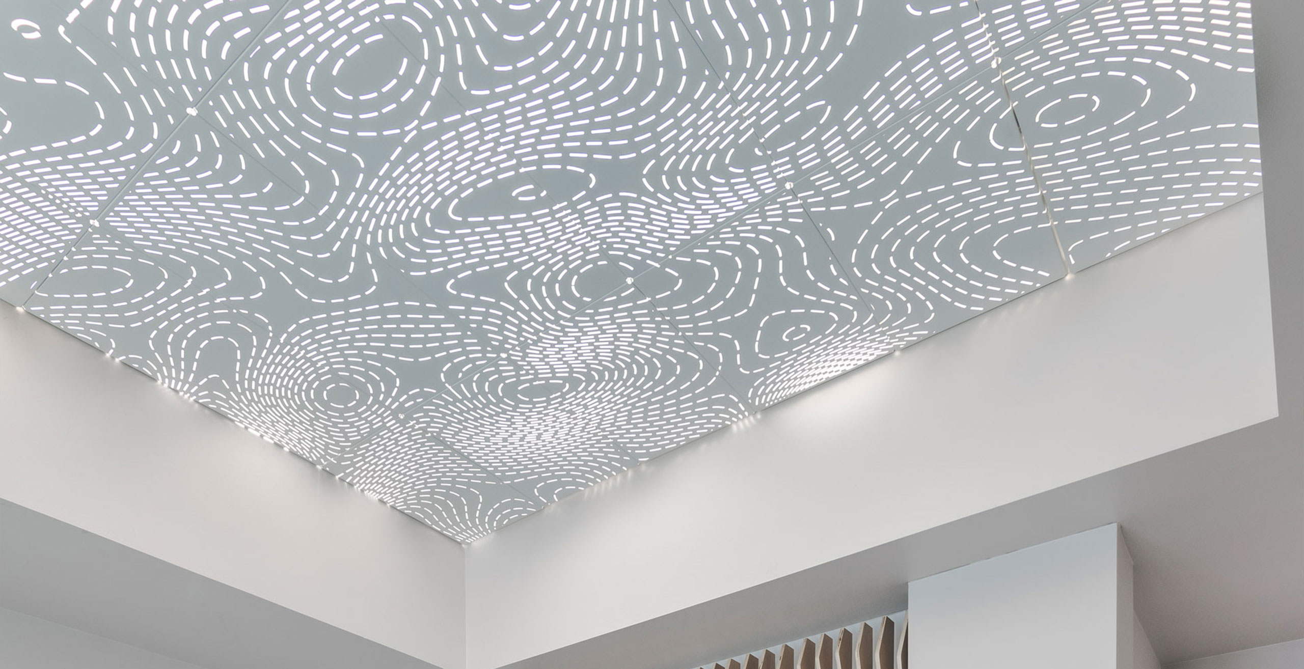 Metal perforate backlit ceiling in Austin, TX from Andalusia a leading architectural fabrication firm in the US