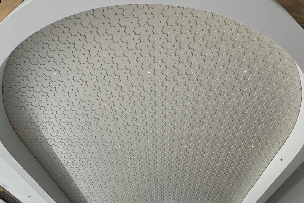 Two-layer, white MDF residential ceiling with integrated lighting