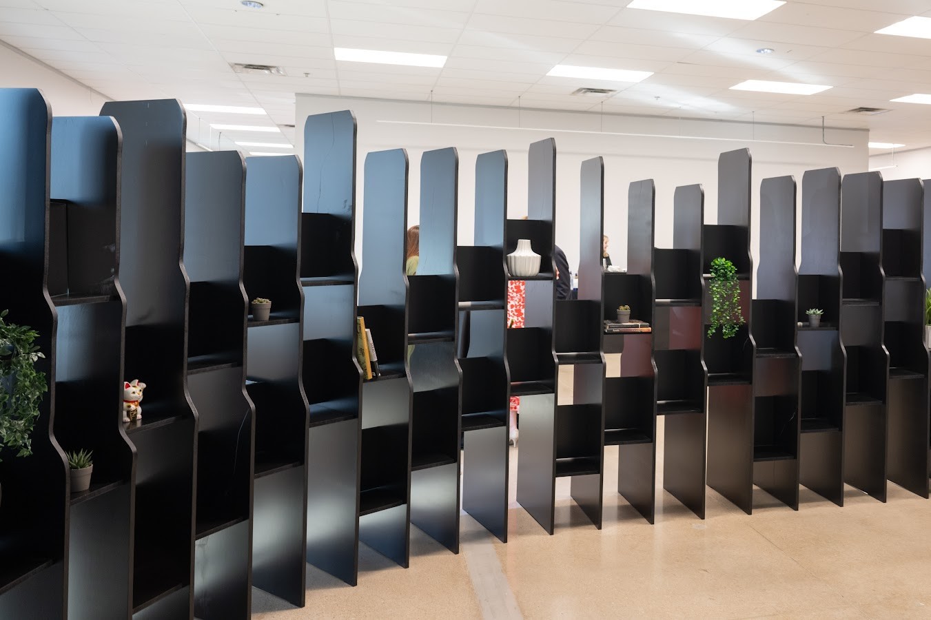 Slat divider system in open office used for wayfinding