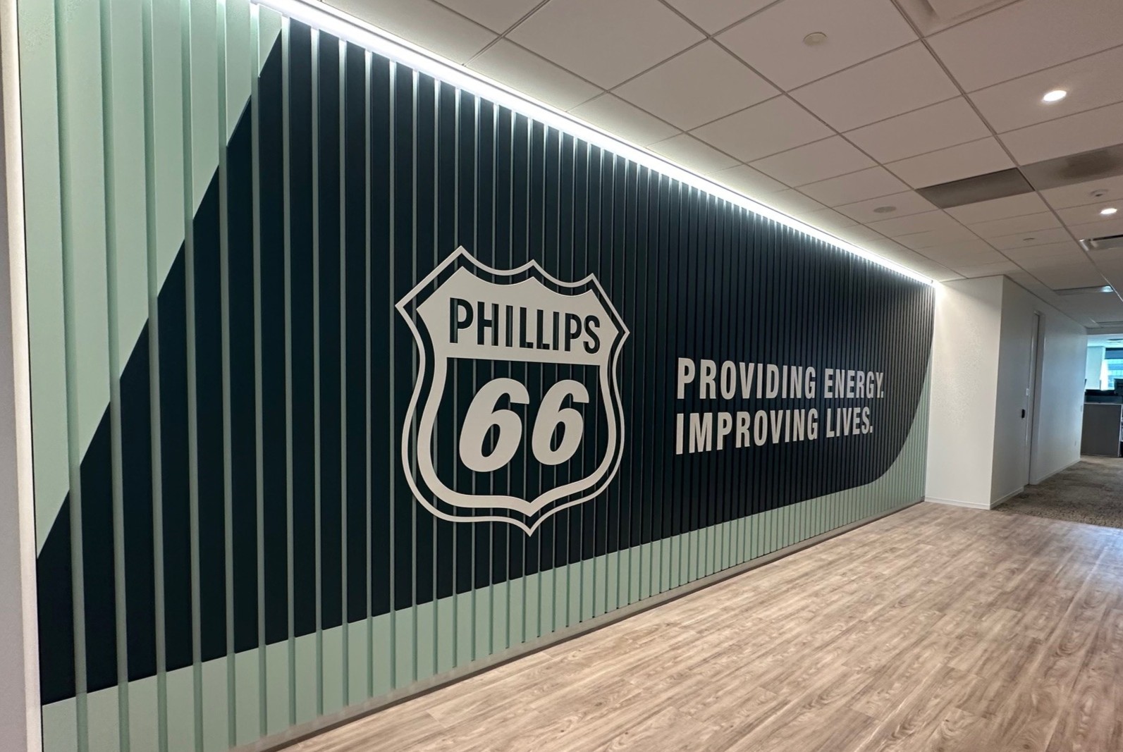 Phillips 66 Dynamic Plank wall with integrated logo